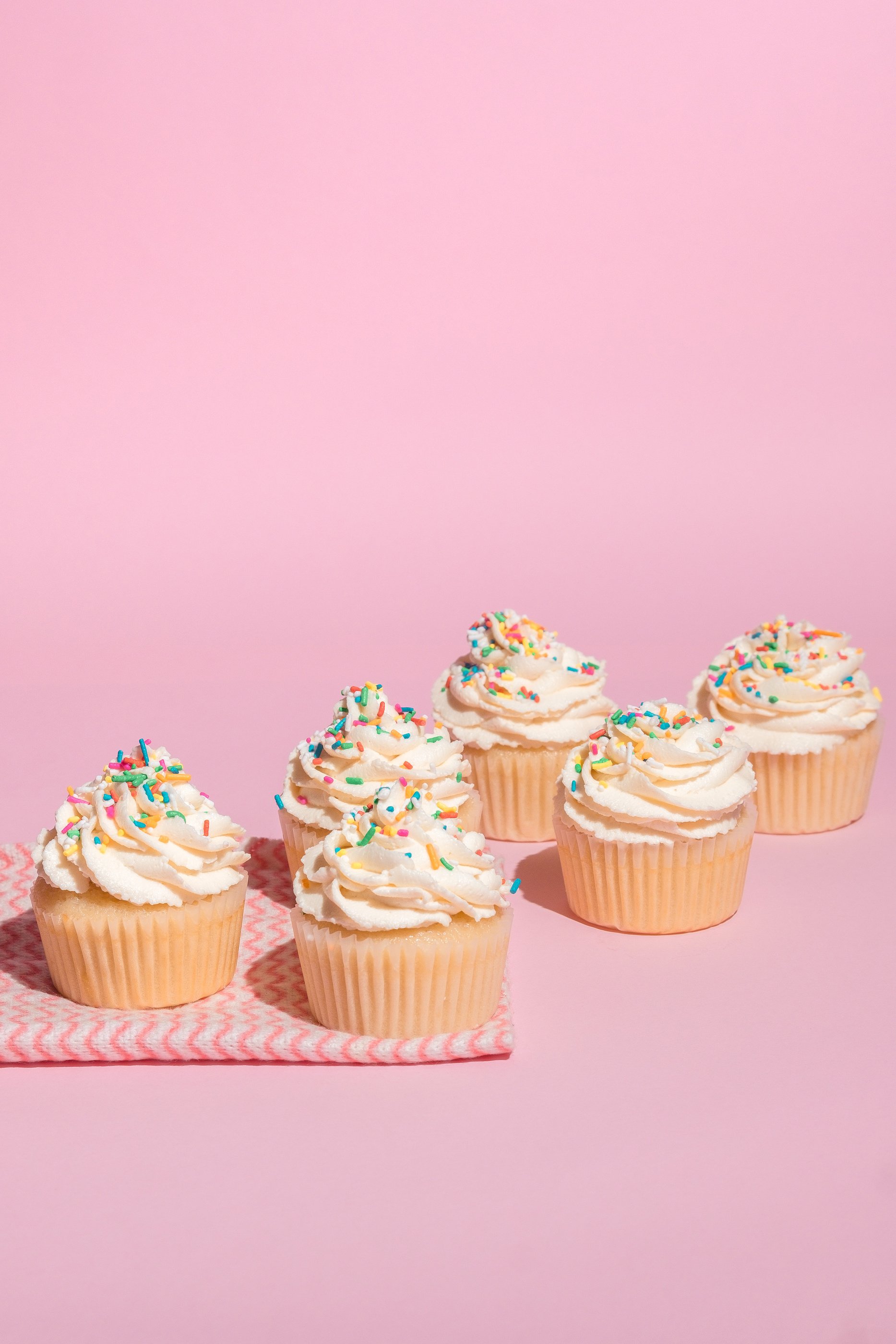 Cupcakes on Pink Background